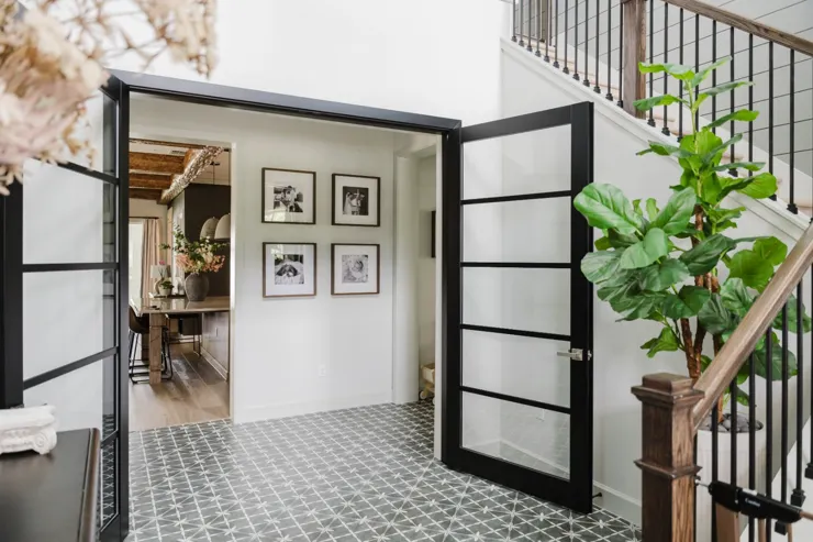 Bedroom framed by glass doors