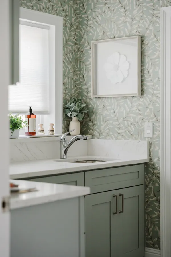 Botanical bathroom and green cabinetry